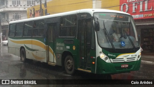 Transporte e Turismo Iluminada MG 1.066 na cidade de Magé, Rio de Janeiro, Brasil, por Caio Arêdes. ID da foto: 8542455.