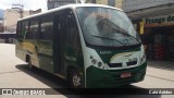 Transporte e Turismo Iluminada MG 2.009 na cidade de Magé, Rio de Janeiro, Brasil, por Caio Arêdes. Número da foto: #8542716.