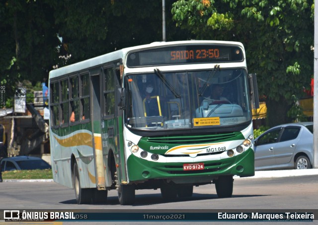Transporte e Turismo Iluminada MG 1.048 na cidade de Magé, Rio de Janeiro, Brasil, por Eduardo  Marques Teixeira. Número da foto: #8725883.