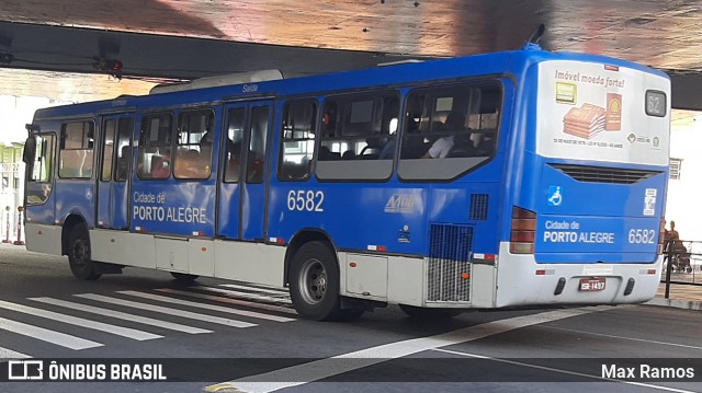 Nortran Transportes Coletivos 6582 na cidade de Porto Alegre, Rio Grande do Sul, Brasil, por Max Ramos. Número da foto: #9190020.